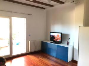 TV a/nebo společenská místnost v ubytování Primera línea de playa
