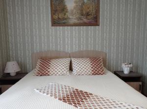 Кровать или кровати в номере 2х комнатная квартира на аллее сосен