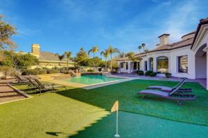 a house with a golf course in the yard at Villa del Sol, Amazing House by Kivoya in Tempe