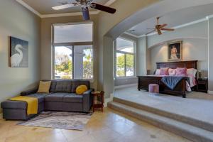 a living room with a couch and a bed at Villa del Sol, Amazing House by Kivoya in Tempe