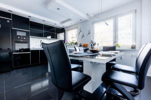 Kuchyňa alebo kuchynka v ubytovaní Apartament SunForYou 2