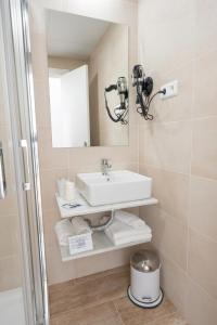 Un baño de Hotel Romerito