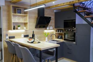 Virtuvė arba virtuvėlė apgyvendinimo įstaigoje Apartment Ispod ure
