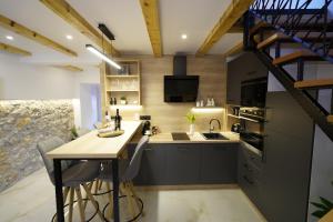 Kuchyň nebo kuchyňský kout v ubytování Apartment Ispod ure
