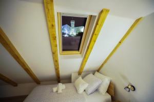 Postel nebo postele na pokoji v ubytování Apartment Ispod ure