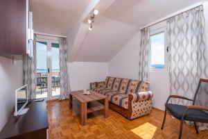 Posezení v ubytování Holiday Apartments Zora