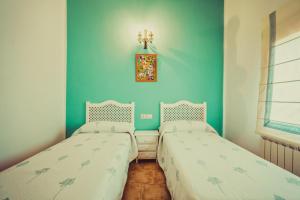 Cama o camas de una habitación en Posada Peñarubia