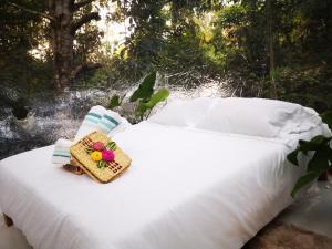 Postel nebo postele na pokoji v ubytování Glamping Amazonas