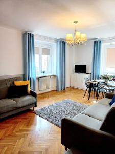 O zonă de relaxare la Corner Apartament Piłsudskiego - 5 min od Dworca Głównego - Main Railway Station