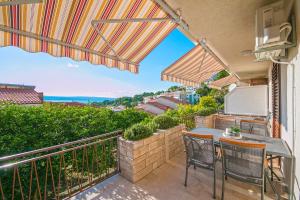 Balkón nebo terasa v ubytování Seaview Center House Brela