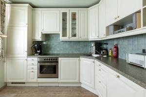 Kuchyňa alebo kuchynka v ubytovaní Wohnung in Zentrumsnähe beim Hauptbahnhof (100 m2)