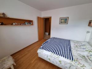 Una cama o camas en una habitación de APP Lucija