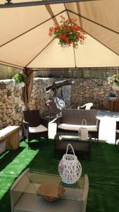 Posedenie v ubytovaní Appartamento in villa vita