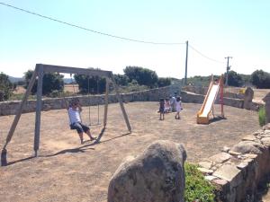 Детска площадка в Agriturismo Rocca su Moru