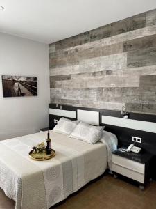 Postel nebo postele na pokoji v ubytování Hotel Daymiel