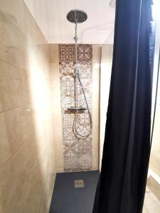 A bathroom at Les Rêves d'Eden Gite dans Mas Cévenol -SPA privatif