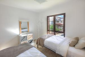 Postel nebo postele na pokoji v ubytování Villas Sicilia + 37 fotografií