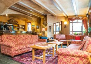 Posezení v ubytování Hotel Vallée De Cogne