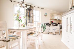 Φωτογραφία από το άλμπουμ του Ferienhaus Schilfrohrsaenger 30 σε Fuhlendorf