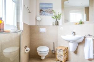 Ένα μπάνιο στο Ferienhaus Schilfrohrsaenger 30 +27 φωτογραφίες