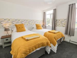 Giường trong phòng chung tại Manor Heath - The Penthouse