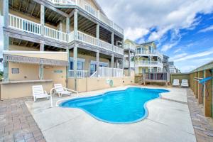 an image of a swimming pool in front of a building at Magic Moments 999 in Avon