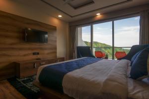 Μια τηλεόραση ή/και κέντρο ψυχαγωγίας στο Tripli Hotels Shivaay