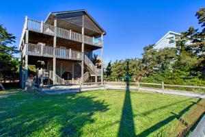 a house with a large yard in front of it at 1 Good Life 774 in Avon