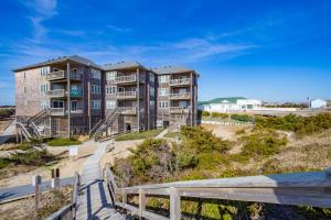 an aerial view of apartment buildings on the beach at Waves Crest 338 IC in Avon