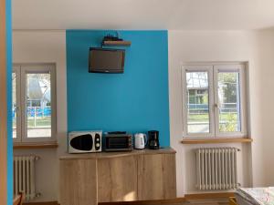 A kitchen or kitchenette at Bikeapartments Appartamenti Laura & Jasmin