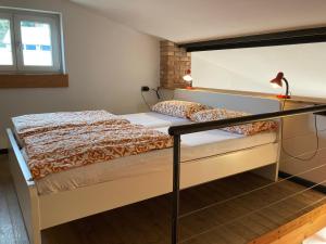 A bed or beds in a room at Bikeapartments Appartamenti Laura & Jasmin