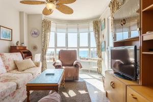 TV a/nebo společenská místnost v ubytování Apartamento Lance del Sol