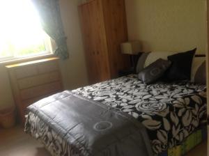 Letto o letti in una camera di Divine Mercy B&B