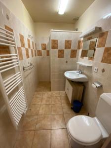 Kúpeľňa v ubytovaní Appartements avec draps inclus dans le tarif