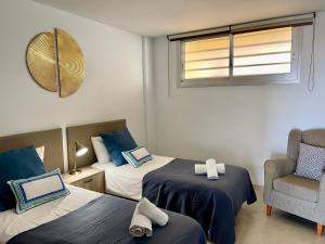Posteľ alebo postele v izbe v ubytovaní Residencias Sol Paraiso
