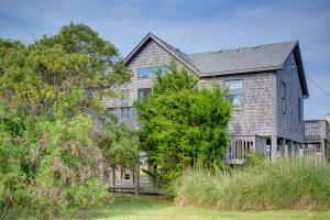 a large house with a gambrel roof at Cape Point 240 in Buxton