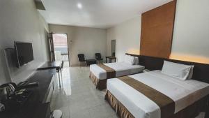 TV i/ili multimedijalni sistem u objektu LPP Convention Hotel Demangan