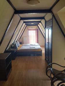 Posteľ alebo postele v izbe v ubytovaní Medences, panoramas nyaralo Sukoron