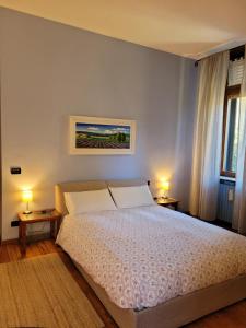 Кровать или кровати в номере B&B Villa Tavallini