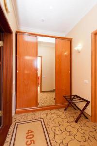 a room with a hallway with a door and a mirror at Для Вас in Penza
