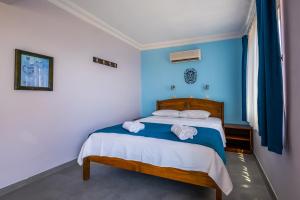 Cama o camas de una habitación en Selim Pansiyon
