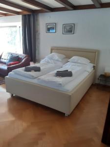 Postel nebo postele na pokoji v ubytování Ferienwohnung Bodenseeblick