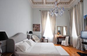 Voodi või voodid majutusasutuse Hotel Ploes toas