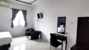 Afbeelding uit fotogalerij van Hotel Aqiilah Syariah in Lamongan