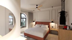Rúm í herbergi á Albi Boutique Hotel - Traveler's Choice 2024