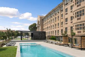 The swimming pool at or close to The Archer Aparthotel by Totalstay