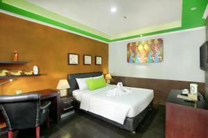 Voodi või voodid majutusasutuse Negara Hotel - CHSE Certified toas