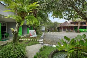 Zahrada ubytování Negara Hotel - CHSE Certified
