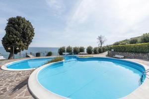 The swimming pool at or close to Front Lake Amazing View
