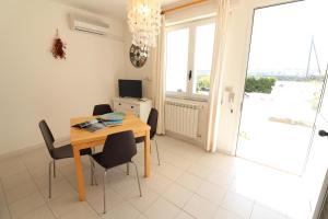 A television and/or entertainment centre at Casa Vacanza Benny Otranto
